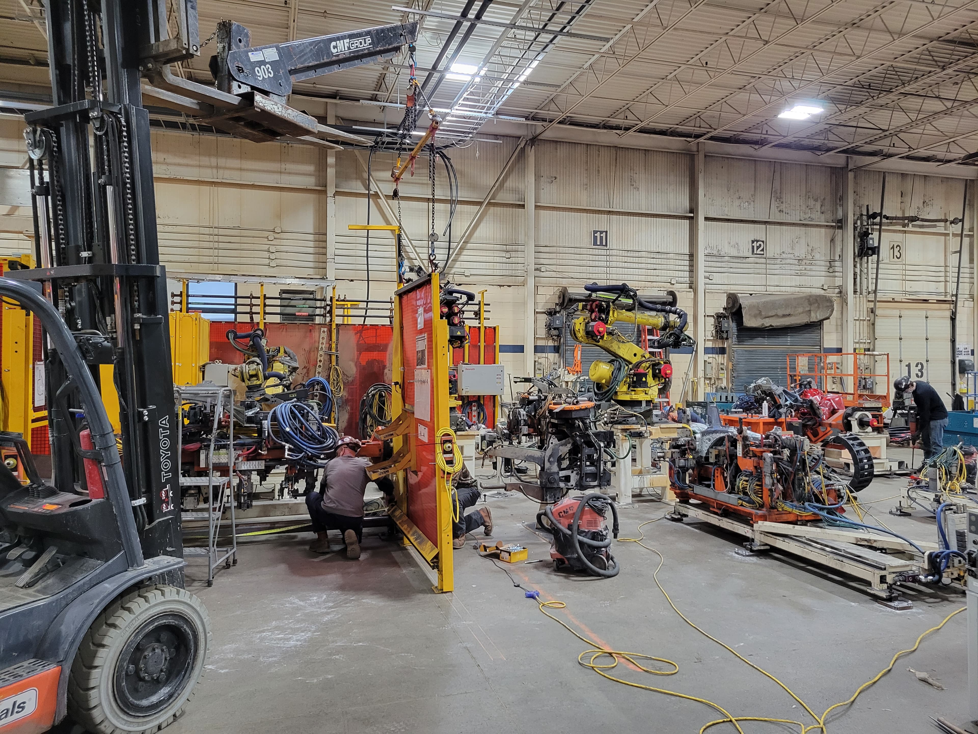 Robot cell guarding installed around a weld station