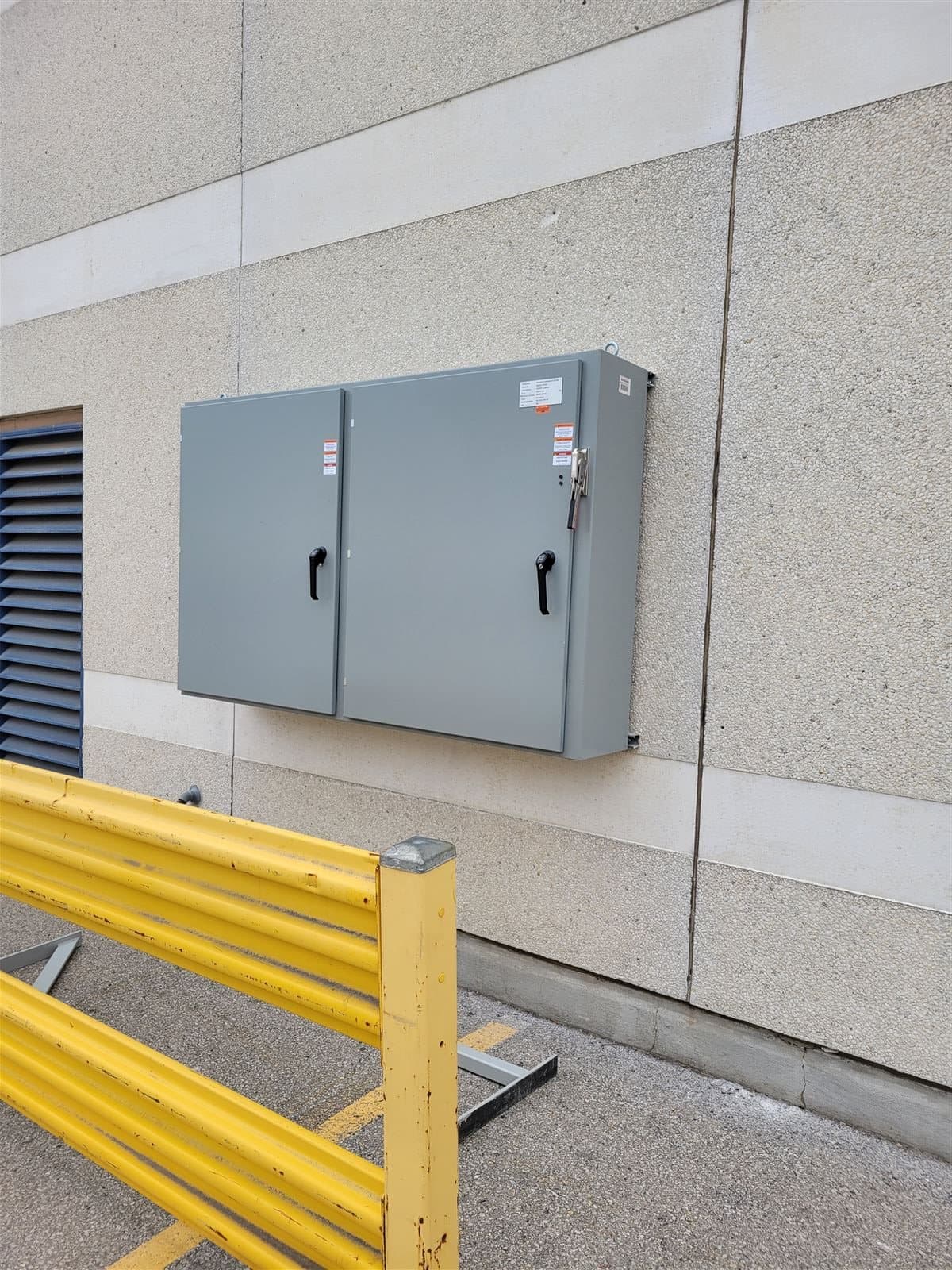 Field-installed junction box wired during a control panel installation