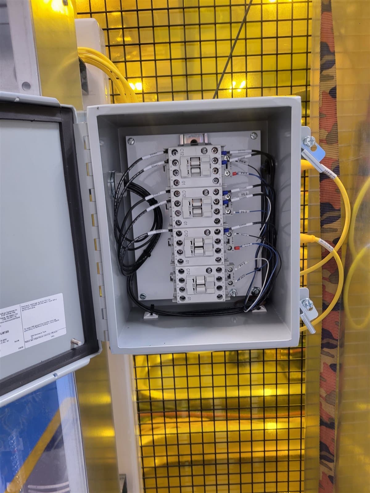 Field-mounted junction box with four wired contactors