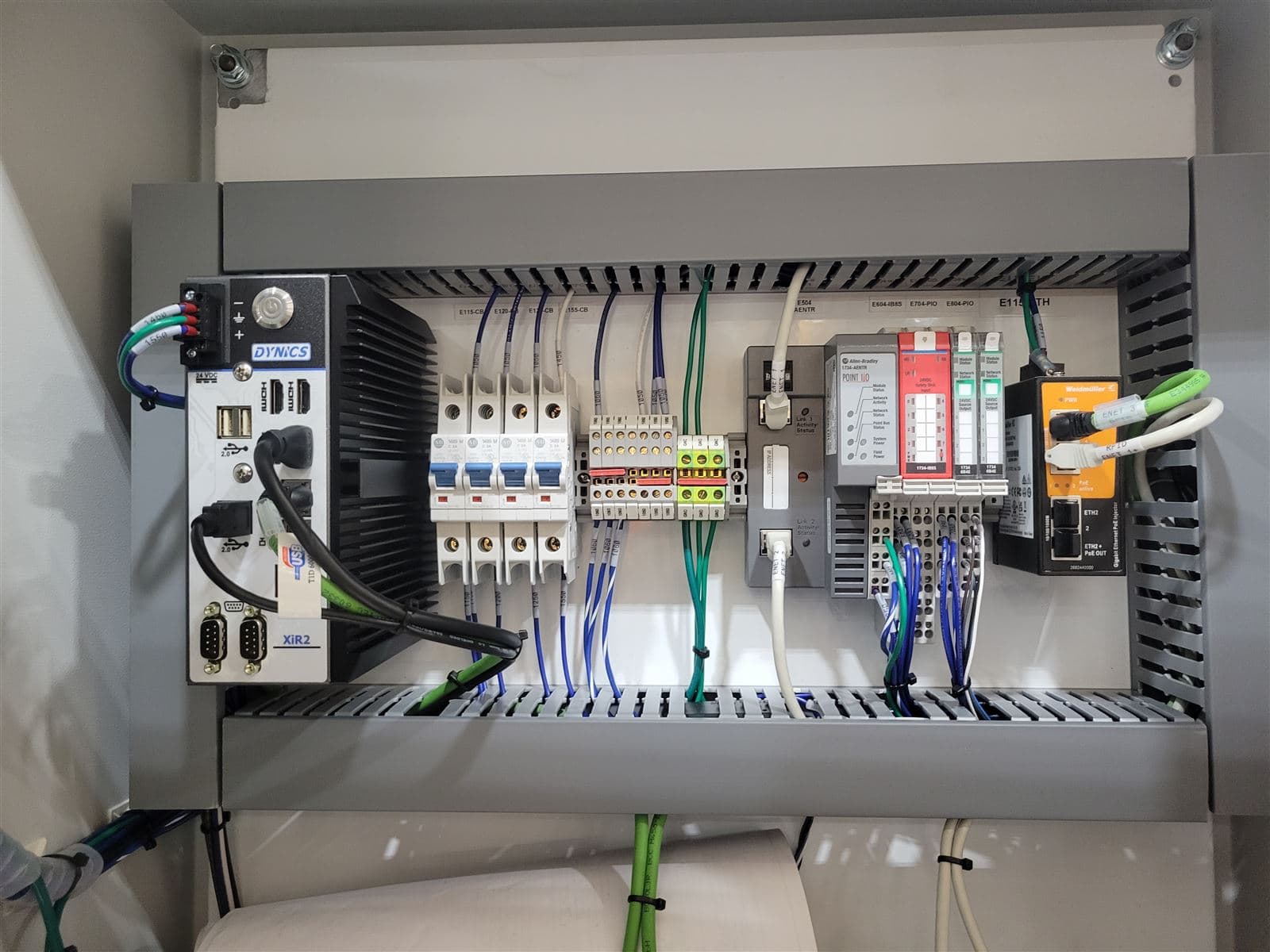 Compact PLC control panel with DIN rail mounted components