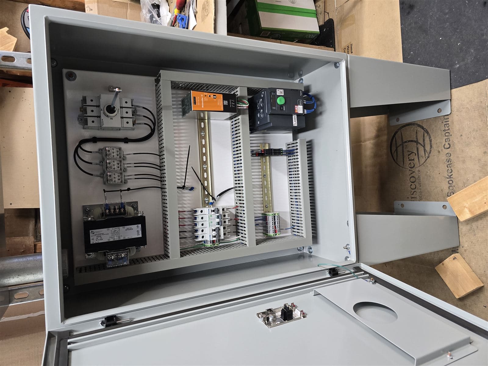 Custom control panel mid-build with disconnect switches in our shop