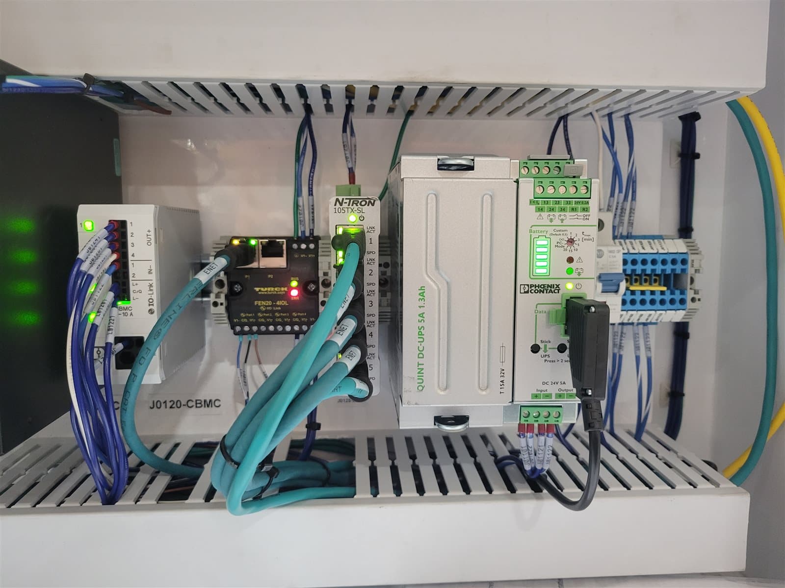 Control panel with managed network switch and UPS battery backup module