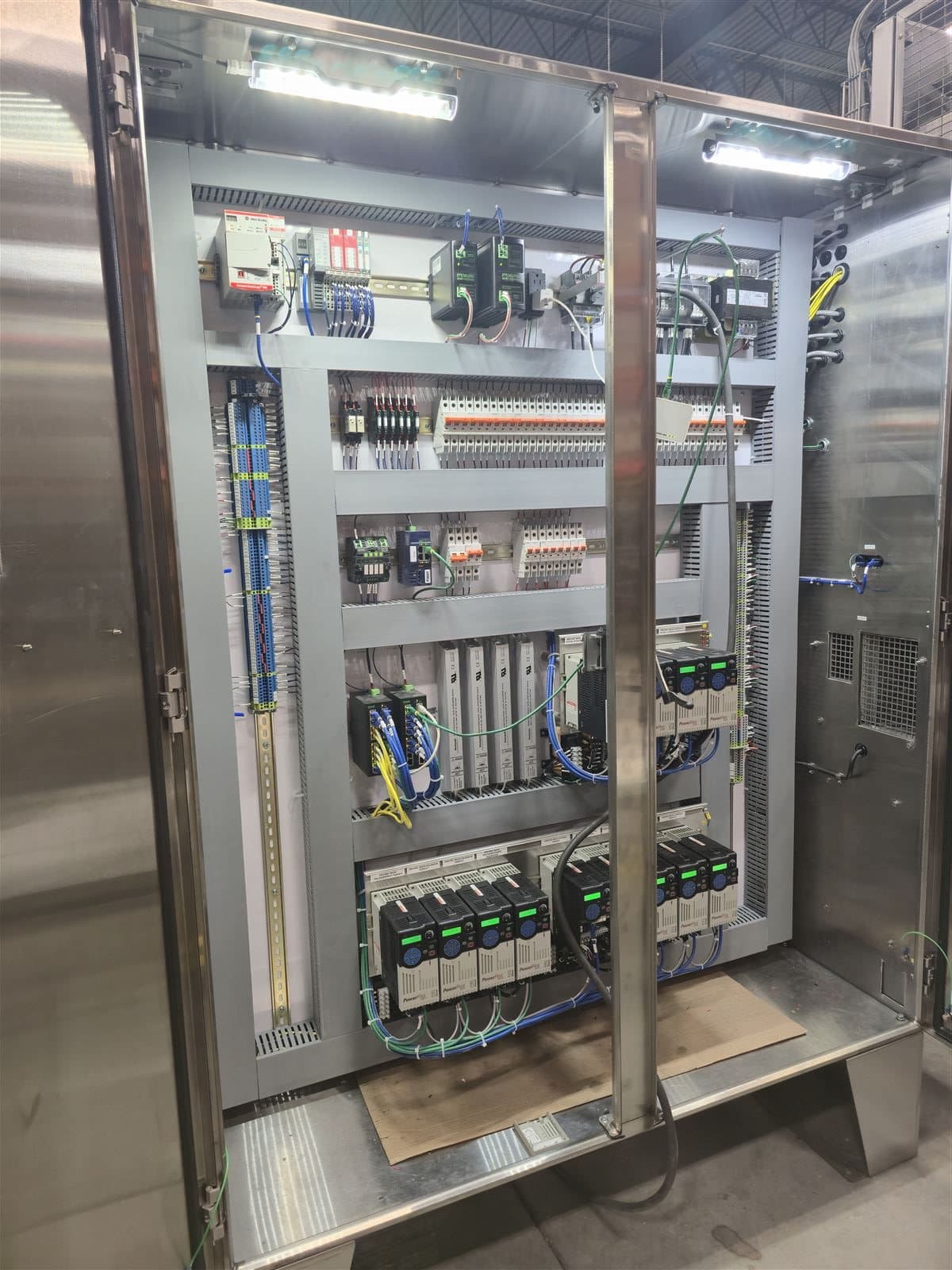 Stainless steel machine control panel with PLC I/O modules