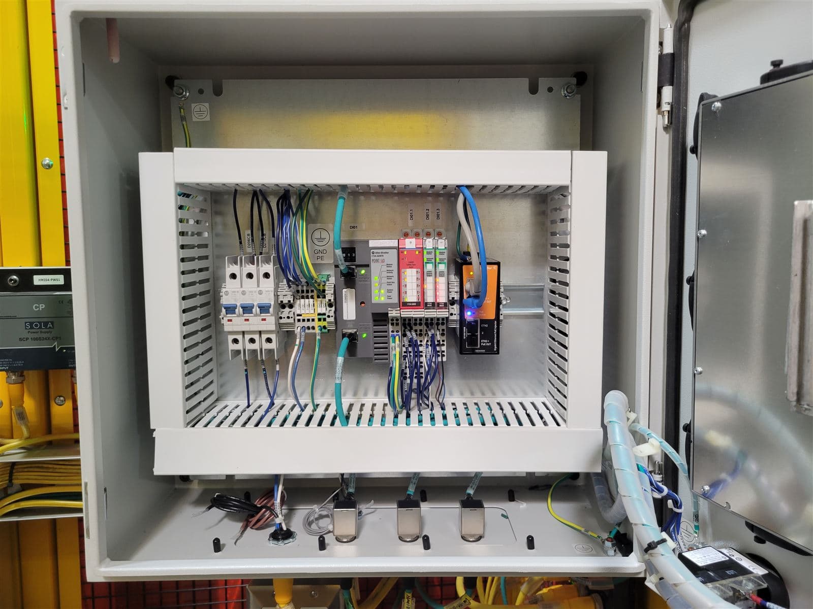 Close-up of labeled wiring inside a custom control panel
