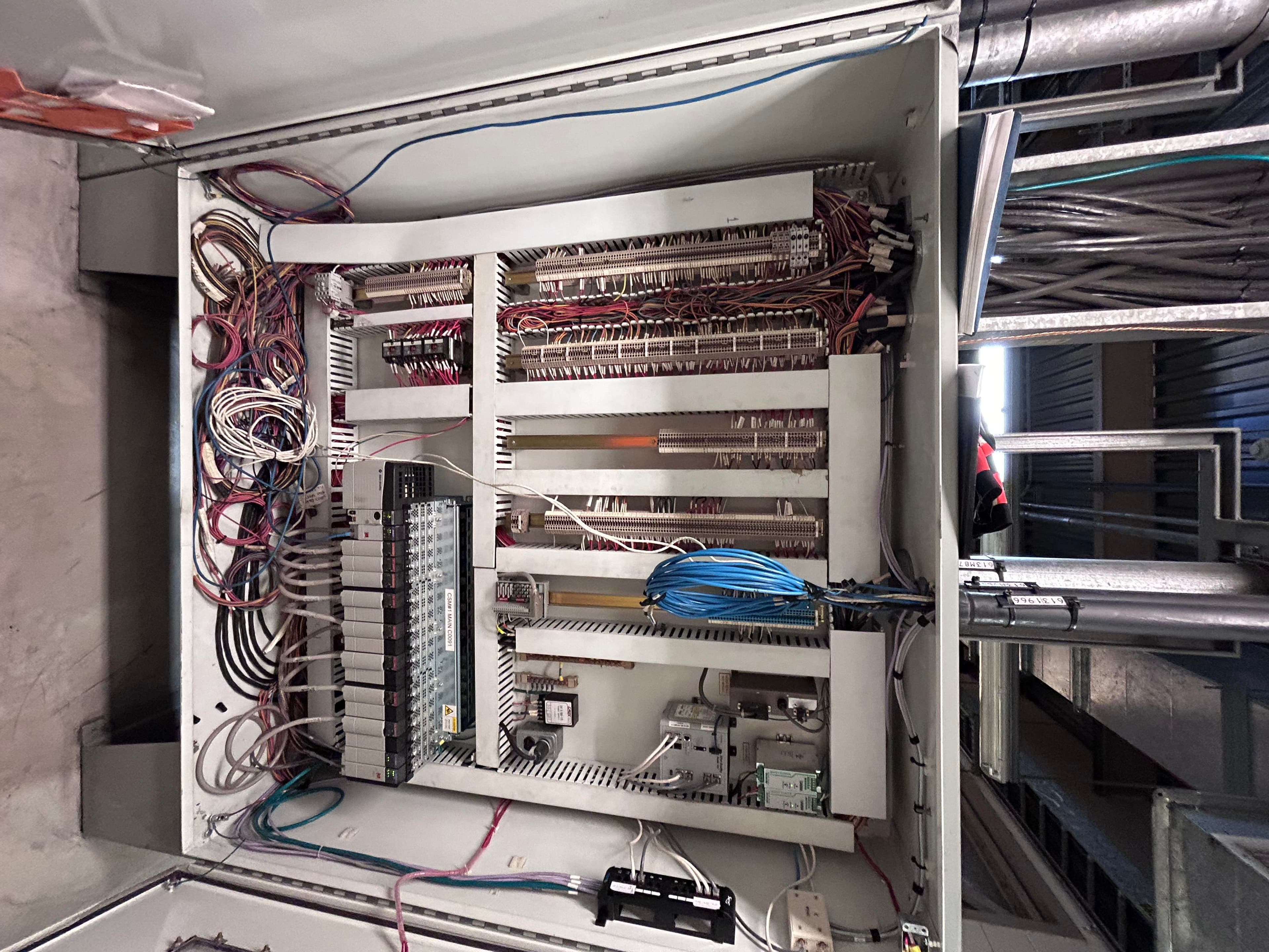 Legacy I/O rack and terminal strips in an obsolete control panel