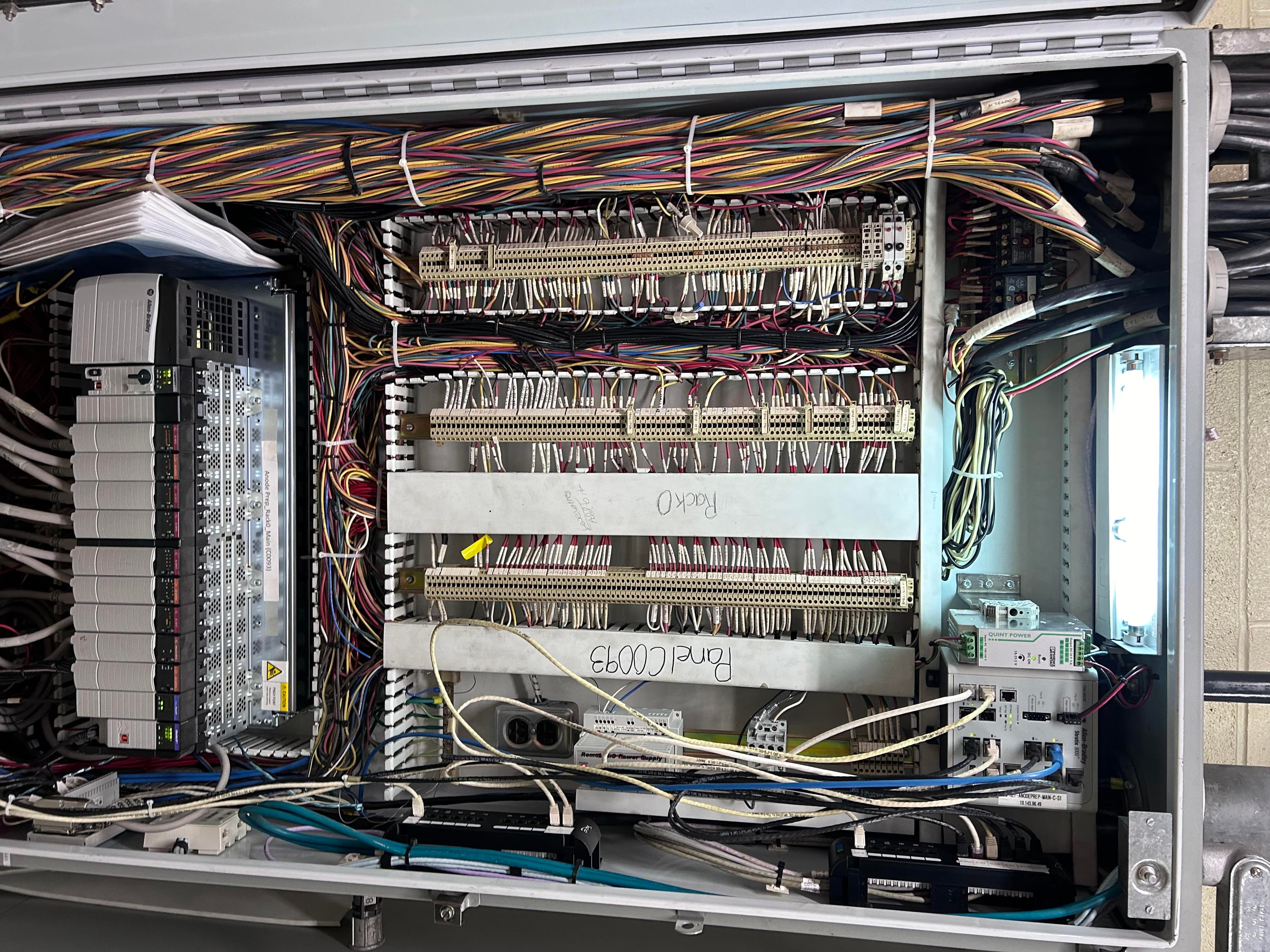 Legacy relay rack and terminal strips ahead of a panel retrofit